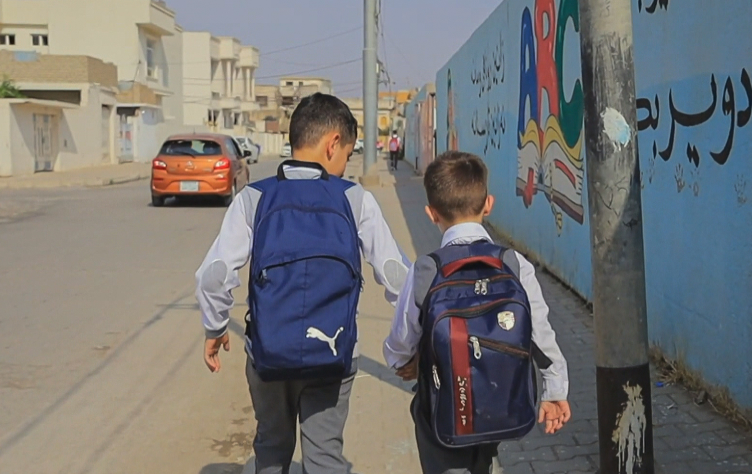 Two children go to school in Duhok province. Date: April 2023. Photo: Rudaw